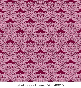 Damask seamless pattern intricate design. Luxury royal ornament, victorian texture for wallpapers, textile, wrapping. Exquisite floral baroque lacy flourish in vintage deep red color.