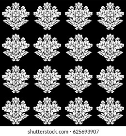 Damask seamless pattern intricate design. Luxury royal ornament, victorian texture for wallpapers, textile, wrapping. Exquisite floral baroque lacy flourish in black and white monochrome colors.