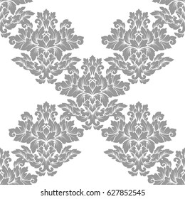 Damask seamless pattern intricate design. Luxury royal ornament, victorian texture for wallpapers, textile, wrapping. Exquisite floral baroque lacy flourish