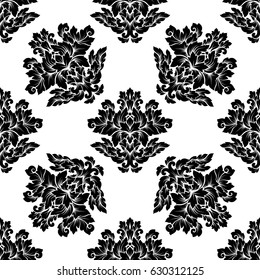 Damask seamless pattern intricate design. Luxury royal ornament, victorian texture for wallpapers, textile, wrapping. Exquisite floral baroque lacy flourish in black and white monochrome colors.