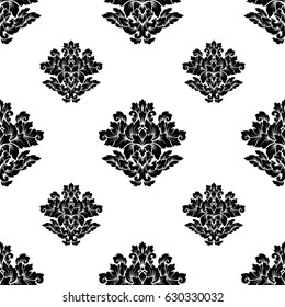 Damask seamless pattern intricate design. Luxury royal ornament, victorian texture for wallpapers, textile, wrapping. Exquisite floral baroque lacy flourish in black and white monochrome colors.