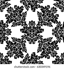 Damask seamless pattern intricate design. Luxury royal ornament, victorian texture for wallpapers, textile, wrapping. Exquisite floral baroque lacy flourish in black and white monochrome colors.