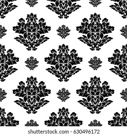 Damask seamless pattern intricate design. Luxury royal ornament, victorian texture for wallpapers, textile, wrapping. Exquisite floral baroque lacy flourish in black and white monochrome colors.