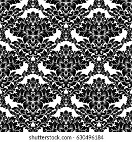 Damask seamless pattern intricate design. Luxury royal ornament, victorian texture for wallpapers, textile, wrapping. Exquisite floral baroque lacy flourish in black and white monochrome colors.