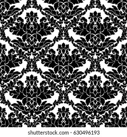 Damask seamless pattern intricate design. Luxury royal ornament, victorian texture for wallpapers, textile, wrapping. Exquisite floral baroque lacy flourish in black and white monochrome colors.