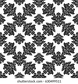 Damask seamless pattern intricate design. Luxury royal ornament, victorian texture for wallpapers, textile, wrapping. Exquisite floral baroque lacy flourish in black and white monochrome colors.