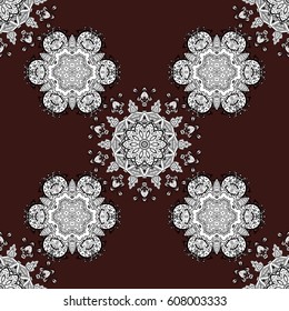 Damask seamless pattern repeating background. Antique white repeatable wallpaper. Vintage element on brown background. White floral ornament in baroque style.