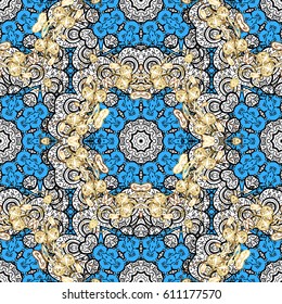 Damask seamless pattern repeating background. Gold Wallpaper on texture background. Golden element on blue background. Gold blue floral ornament in baroque style.