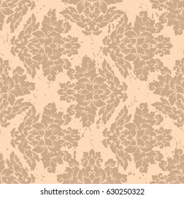 Damask seamless pattern with thin cracks and scratches. Luxury royal ornament with aged look, victorian texture for wallpapers, textile, wrapping. Exquisite floral baroque lacy foliage in beige color.