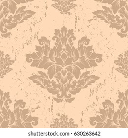 Damask seamless pattern with thin cracks and scratches. Luxury royal ornament with aged look, victorian texture for wallpapers, textile, wrapping. Exquisite floral baroque lacy foliage in beige color