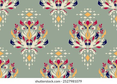 Damask seamless pattern,Ikat floral seamless pattern on green background,vector illustration,Ikat ethnic oriental embroidery,Aztec style,baroque.design for texture,fab,clothing,decoration,fashion.