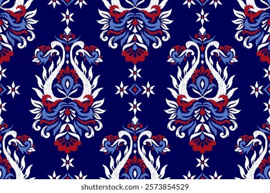 Damask seamless pattern,Ikat floral seamless pattern on blue background,vector illustration,Ikat ethnic oriental embroidery,Aztec style,baroque.design for texture,fab,clothing,decoration,fashion,print