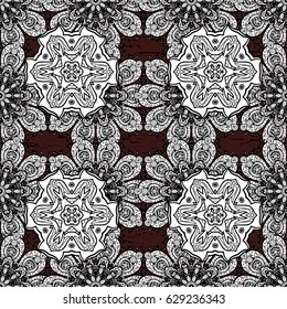 Damask seamless repeating background. White Wallpaper on texture background. White element on brown background. White floral ornament in baroque style.