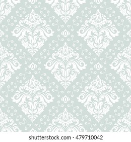 Damask vector classic light blue and white pattern. Seamless abstract background with repeating elements