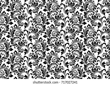 Damask wallpaper. A seamless vector background. Black and white texture. Floral ornament