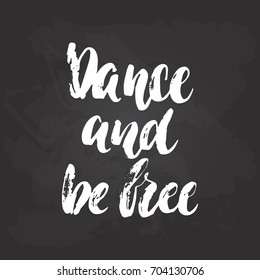Dance and be free - lettering dancing calligraphy quote drawn by ink in white color on the black chalkboard background. Fun hand drawn lettering inscription