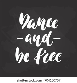 Dance and be free - lettering dancing calligraphy quote drawn by ink in white color on the black chalkboard background. Fun hand drawn lettering inscription