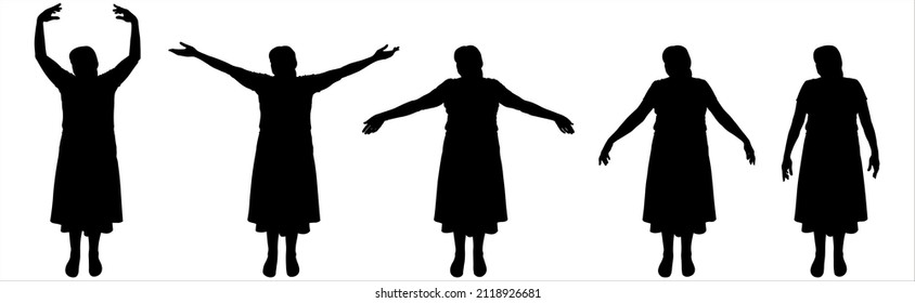 Dance lesson, ballet. Hands in motion, legs without movement, standing still. Smooth, elegant, graceful hand movements. A group of women stands straight and moves their arms. The head looks sideways.