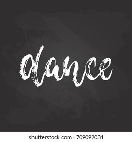 Dance - lettering dancing calligraphy quote drawn by ink in white color on the black chalkboard background. Fun hand drawn lettering inscription