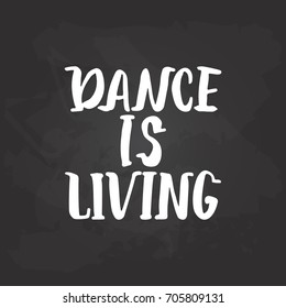 Dance is living - lettering dancing calligraphy quote drawn by ink in white color on the black chalkboard background. Fun hand drawn lettering inscription