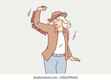 Dancing cawgirl in hat and rider clothes from wild west to have fun at parties in western style. Dancing rancher woman laughing inviting guests to festival or disco in american state of texas