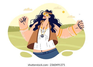 Dancing hippie woman with pacific sign on chain, performs open-air dance and calls for abandonment of wars. Young girl is fond of hippie subculture and enjoys freedom and lack of rules in community