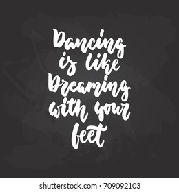 Dancing is like dreaming with your feet - lettering dance calligraphy quote drawn by ink in white color on the black chalkboard background. Fun hand drawn lettering inscription