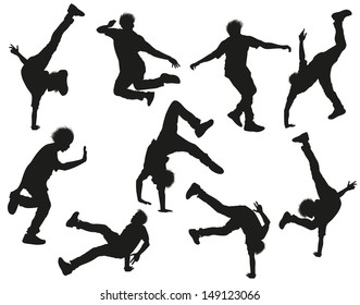 Dancing male silhouettes on white 