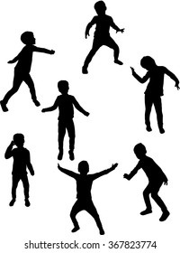 Dancing silhouettes of children.