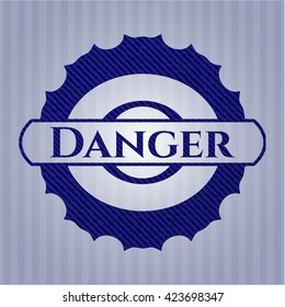 Danger badge with denim background