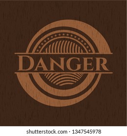 Danger badge with wooden background