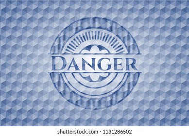 Danger blue hexagon emblem.
