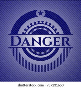 Danger emblem with denim high quality background