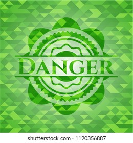 Danger green emblem with mosaic background