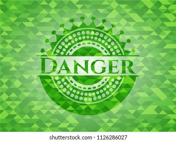 Danger green emblem with mosaic background