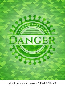Danger green emblem with triangle mosaic background