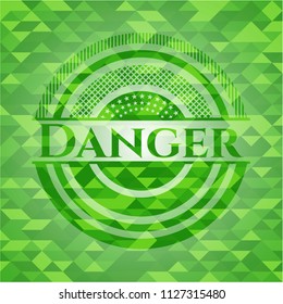 Danger green emblem with triangle mosaic background