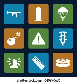 Danger icons set. set of 9 danger filled icons such as siren, traffic light, bomb, smoke bomb, bullet, ammo, submachine gun, parachute