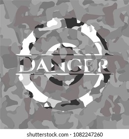 Danger on grey camouflage texture