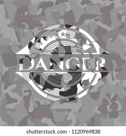 Danger on grey camouflaged texture