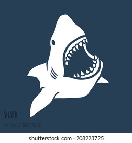 Danger Shark silhouettes in the deep blue set. Vector