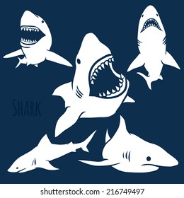 Danger Shark silhouettes in the deep blue set. Vector