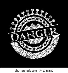 Danger written with chalkboard texture