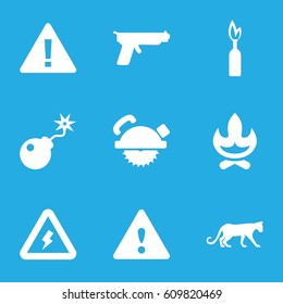 Dangerous icons set. set of 9 dangerous filled icons such as panther, saw blade, bomb, warning, voltage warning, dynamite, gun