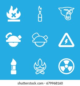 Dangerous icons set. set of 9 dangerous filled and outline icons such as brush, saw blade, no fire, voltage warning, radiation, panther, dynamite
