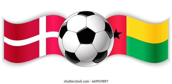 Danish and Bissau-Guinean wavy flags with football ball. Denmark combined with Guinea-Bissau isolated on white. Football match or international sport competition concept.