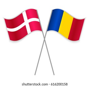 Danish and Chadian crossed flags. Denmark combined with Chad isolated on white. Language learning, international business or travel concept.