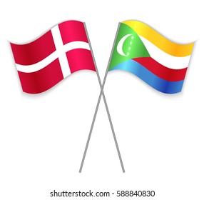 Danish and Comoran crossed flags. Denmark combined with Comoros isolated on white. Language learning, international business or travel concept.