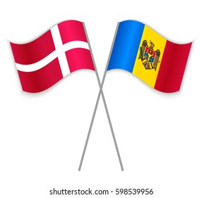 Danish and Moldovan crossed flags. Denmark combined with Moldova isolated on white. Language learning, international business or travel concept.