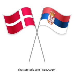 Danish and Serbian crossed flags. Denmark combined with Serbia isolated on white. Language learning, international business or travel concept.